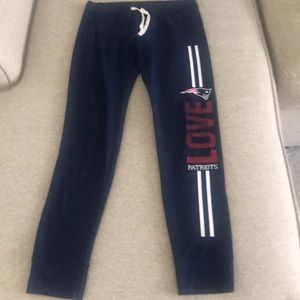 Navy blue sweat pants. Patriots logo